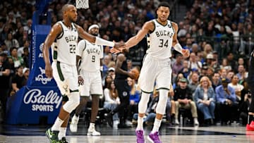 Feb 3, 2024; Dallas, Texas, USA; Milwaukee Bucks forward Khris Middleton (22) and forward Giannis Antetokounmpo (34) during the game between the Dallas Mavericks and the Milwaukee Bucks at the American Airlines Center. Mandatory Credit: Jerome Miron-Imagn Images