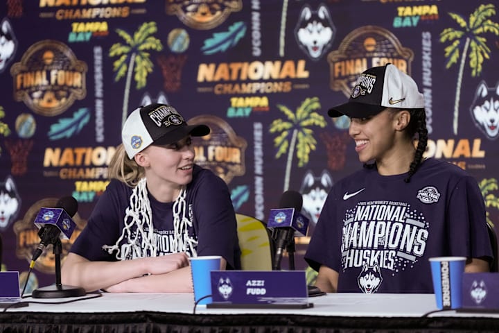 UConn guards Paige Bueckers and Azzi Fudd speak to the media after the national championship 