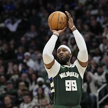 Feb 8, 2024; Milwaukee, Wisconsin, USA; Milwaukee Bucks forward Jae Crowder (99) shoots during the third quarter against the Minnesota Timberwolves at Fiserv Forum. Mandatory Credit: Jeff Hanisch-Imagn Images