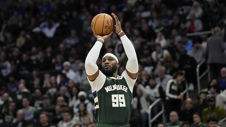 Feb 8, 2024; Milwaukee, Wisconsin, USA;  Milwaukee Bucks forward Jae Crowder (99) shoots during the third quarter against the Minnesota Timberwolves at Fiserv Forum. Mandatory Credit: Jeff Hanisch-Imagn Images