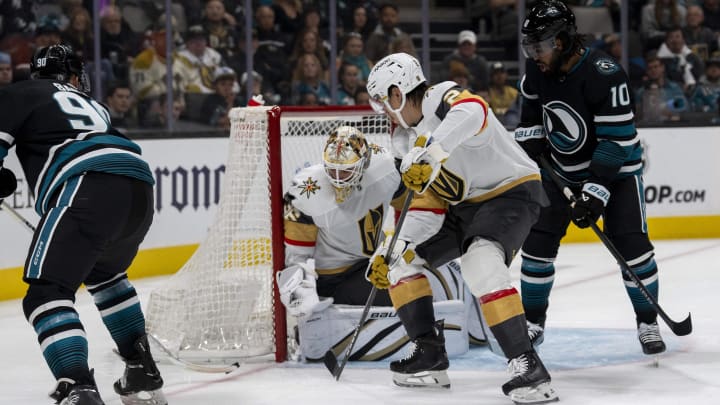 Feb 19, 2024; San Jose, California, USA; San Jose Sharks right wing Justin Bailey (90) shoots the