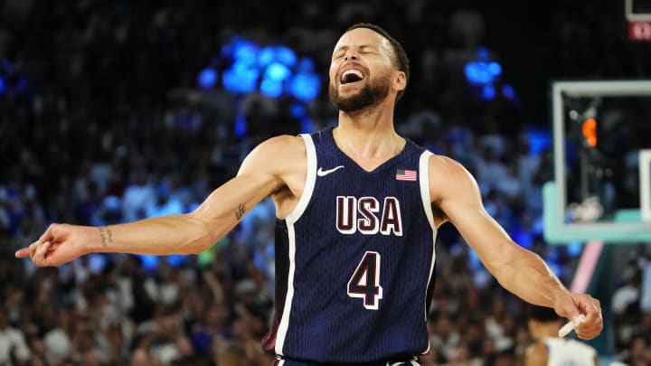 United States shooting guard Stephen Curry (4) celebrates after defeating France in the men's basketball gold medal game during the Paris 2024 Olympic Summer Games at Accor Arena. Mandatory Credit: