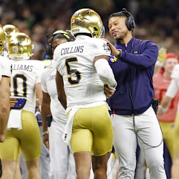 Jan 2, 2025; New Orleans, LA, USA; Notre Dame Fighting Irish wide receiver Beaux Collins (5) celebrates after scoring a touch down during the second quarter against Georgia Bulldogs at Caesars Superdome. 