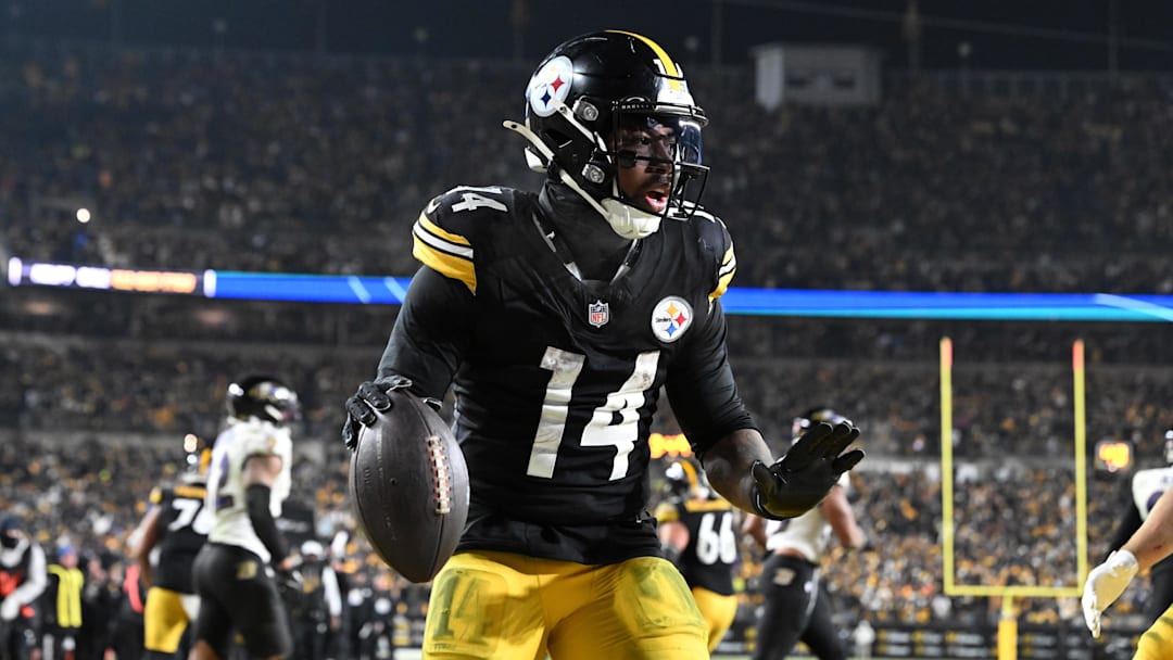 Jan 4, 2026; Pittsburgh, Pennsylvania, USA; Pittsburgh Steelers running back Kenneth Gainwell (14) rushes for a touchdown against the Baltimore Ravens during the second half at Acrisure Stadium. Mandatory Credit: Barry Reeger-Imagn Images