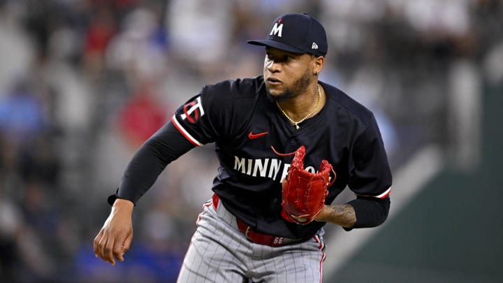 Aug 18, 2024; Arlington, Texas, USA; Minnesota Twins relief pitcher Jorge Alcala (66) pitches against the Texas Rangers during the seventh inning at Globe Life Field.