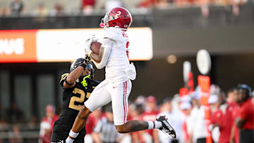 Oct 5, 2024; Nashville, Tennessee, USA;  Alabama Crimson Tide wide receiver Ryan Williams (2) makes a catch over Vanderbilt Commodores cornerback Jaylin Lackey (27) during the second half at FirstBank Stadium. Mandatory Credit: Steve Roberts-Imagn Images