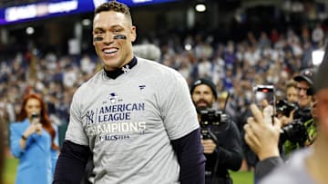 Oct 19, 2024; Cleveland, Ohio, USA; New York Yankees outfielder Aaron Judge (99) celebrates after beating the Cleveland Guardians during game five of the ALCS for the 2024 MLB playoffs at Progressive Field. Mandatory Credit: Scott Galvin-Imagn Images
