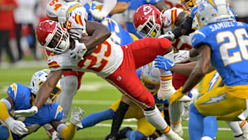 Sep 29, 2024; Inglewood, California, USA;  Kansas City Chiefs running back Kareem Hunt (29) carries the ball to the 3-yard line and scored a touchdown on the next play in the second half against the Los Angeles Chargers at SoFi Stadium. Mandatory Credit: Jayne Kamin-Oncea-Imagn Images