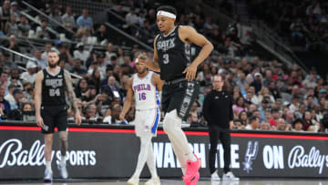 Apr 7, 2024; San Antonio, Texas, USA;  San Antonio Spurs forward Keldon Johnson (3) leaves the court after an injury in the second half against the Philadelphia 76ers at Frost Bank Center. Mandatory Credit: Daniel Dunn-USA TODAY Sports