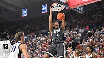 Jan 11, 2025; Spokane, Washington, USA; Washington State Cougars forward LeJuan Watts (4) dunks the ball against the Gonzaga Bulldogs in the first half at McCarthey Athletic Center. Mandatory Credit: James Snook-Imagn Images