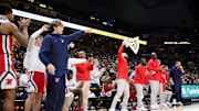Mar 2, 2024; Columbia, Missouri, USA; Mississippi Rebels players and coaches celebrate against the Missouri Tigers after a score during the first half at Mizzou Arena. Mandatory Credit: Denny Medley-Imagn Images