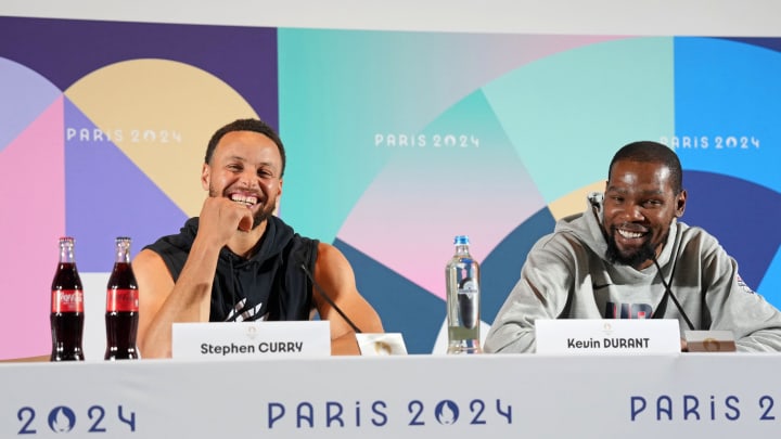 Jul 25, 2024; Paris, France; USA basketball players Stephen Curry and Kevin Durant talk to the media during a press conference. Mandatory Credit: Kirby Lee-USA TODAY Sports