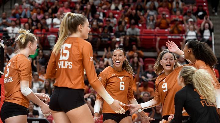 Texas' volleyball team celebrates its winning point against Texas Tech in a Big 12 volleyball match, Sunday, Oct. 2, 2022, at United Supermarkets Arena.0021 20221002 Texastech Texas Volleyball Ar 1246 Jpg