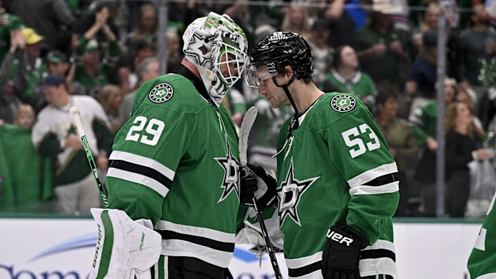 Apr 11, 2026; Dallas, Texas, USA; Dallas Stars center Wyatt Johnston (53) and goaltender Jake Oettinger (29) celebrate after the Stars defeat the New York Rangers at the American Airlines Center. Mandatory Credit: Jerome Miron-Imagn Images