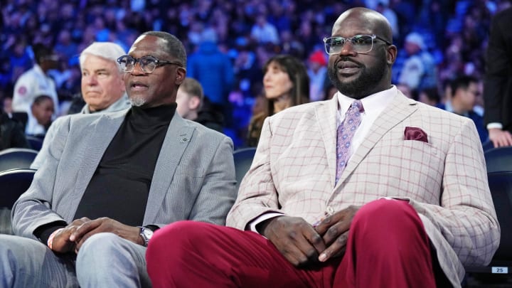 Feb 17, 2024; Indianapolis, IN, USA; Former basketball players Dominique Wilkins (left) and Shaquille O'Neal attend NBA All Star Saturday Night at Lucas Oil Stadium. Mandatory Credit: Kyle Terada-USA TODAY Sports