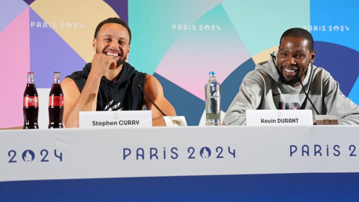 USA basketball players Stephen Curry and Kevin Durant talk to the media during a press conference. Mandatory Credit: