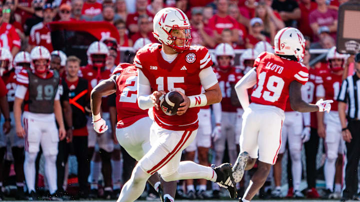 Aug 31, 2024; Lincoln, Nebraska, USA; Nebraska Cornhuskers quarterback Dylan Raiola (15) rolls out to pass against the UTEP Miners during the third quarter at Memorial Stadium. 