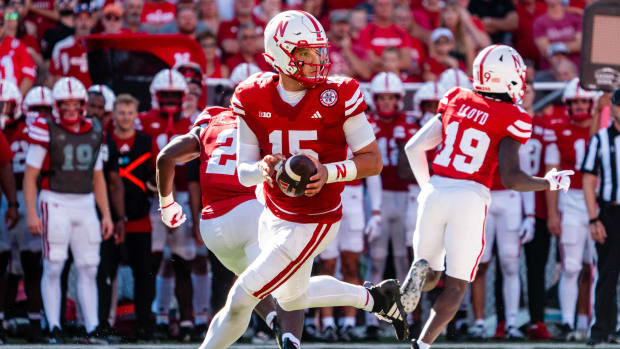 Nebraska Cornhuskers quarterback Dylan Raiola (15) rolls out to pass against the UTEP Miners during the third quarter at Memo