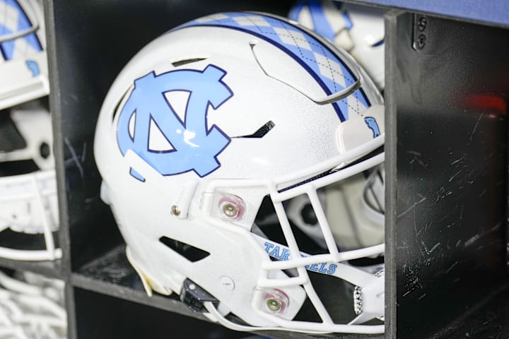 North Carolina Tar Heels white helmet during pregame warm ups against the West Virginia Mountaineers at Bank of America Stadi
