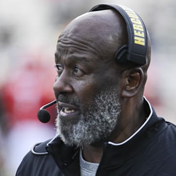 Nov 23, 2024; College Park, Maryland, USA;  Maryland Terrapins head coach Mike Locksley walks down the sidelines during the second  half against the Iowa Hawkeyes at SECU Stadium. Mandatory Credit: Tommy Gilligan-Imagn Images