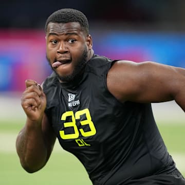 Feb 27, 2025; Indianapolis, IN, USA; Alabama defensive lineman Tim Smith (DL33) participates in drills during the 2025 NFL Combine at Lucas Oil Stadium. Mandatory Credit: Kirby Lee-Imagn Images