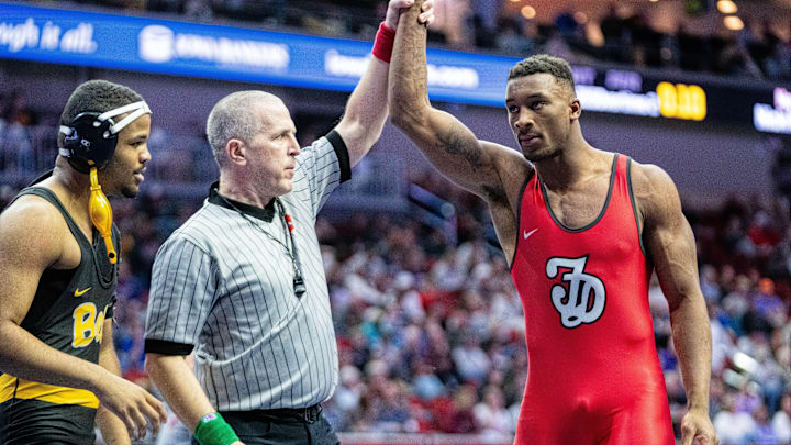 Fort Dodge’s Dreshaun Ross wrestles Bettendorf’s Armon Williams at 285 lbs. on Feb. 18, 2026, at Casey’s Center in Des Moines.