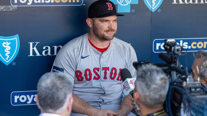 Boston Red Sox pitcher Liam Hendriks (31) is interviewed before the game against the Kansas City Royals at Kauffman Stadium.