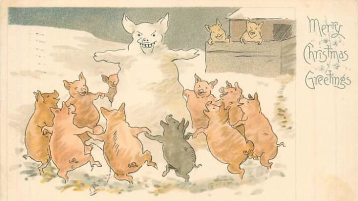 pigs dancing around a terrifying pig snowman