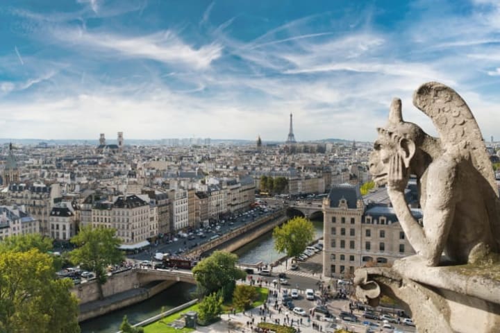 A chimera (not a gargoyle) looks over Paris.
