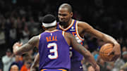 Jan 21, 2024; Phoenix, Arizona, USA; Phoenix Suns guard Bradley Beal (3) and Phoenix Suns forward Kevin Durant (35) hug during the second half of the game against the Indiana Pacers at Footprint Center. Mandatory Credit: Joe Camporeale-Imagn Images