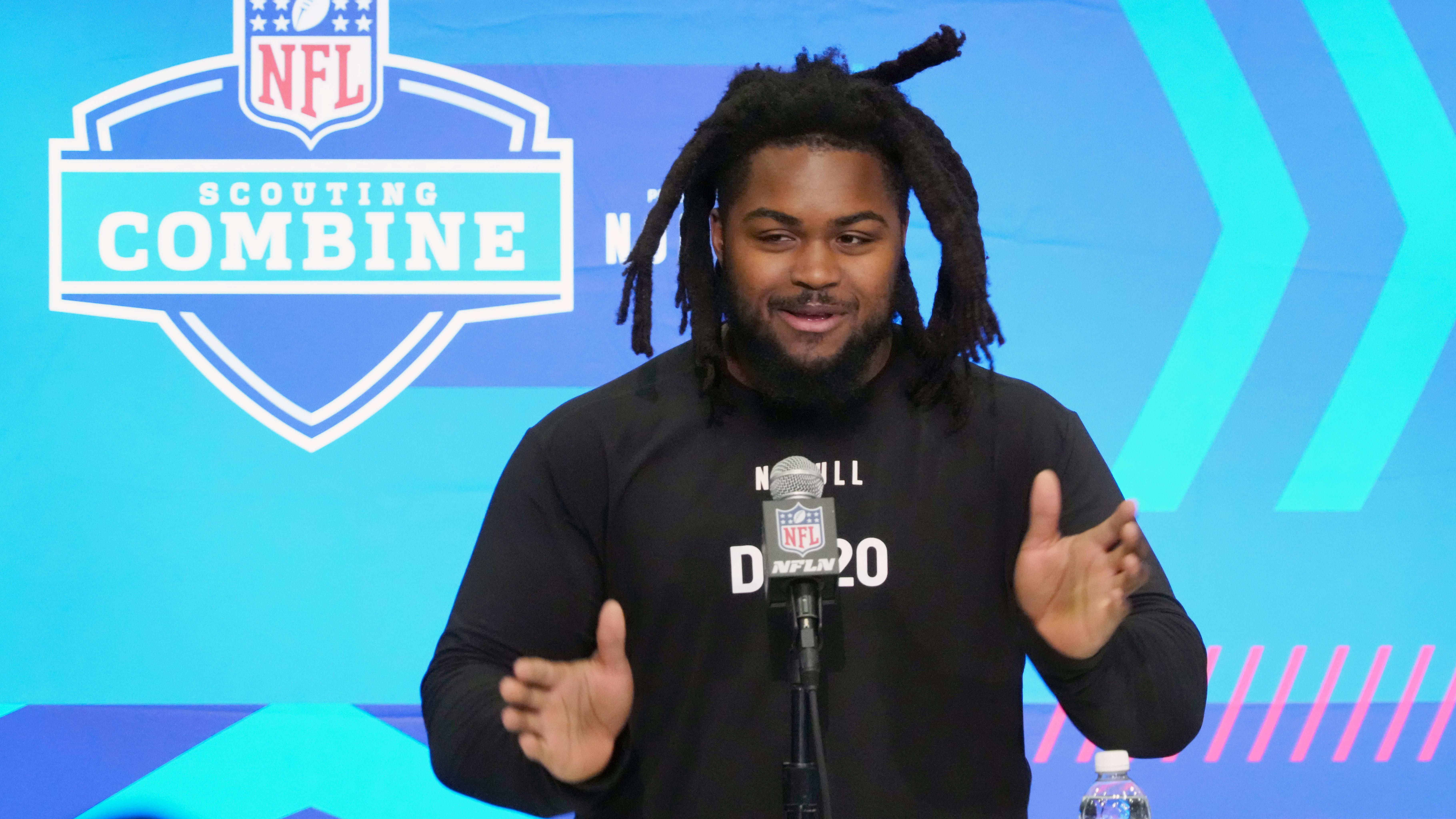 Illinois defensive lineman Johnny Newton (DL20) speaks at the NFL Scouting Combine.