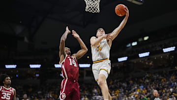 Missouri Tigers forward Caleb Grill (31) drives to the hoop, in a game against the Alabama Crimson Tide this season.