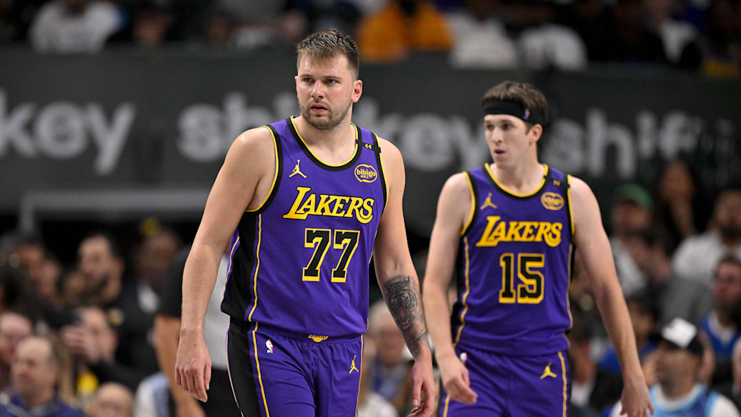 Apr 9, 2025; Dallas, Texas, USA; Los Angeles Lakers guard Luka Doncic (77) and guard Austin Reaves (15) during the game between the Dallas Mavericks and the Los Angeles Lakers at American Airlines Center. Mandatory Credit: Jerome Miron-Imagn Images