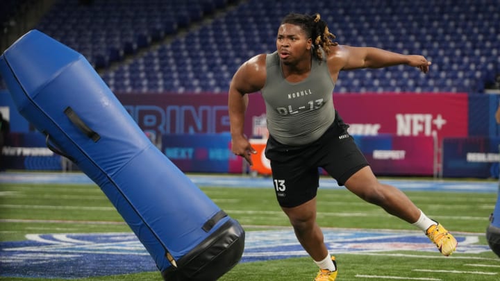 Feb 29, 2024; Indianapolis, IN, USA; Michigan defensive lineman Kris Jenkins (DL13) works out during
