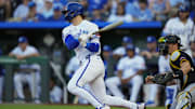 Kansas City Royals shortstop Bobby Witt Jr. hits a single during the first inning against the Pittsburgh Pirates at Kauffman Stadium.