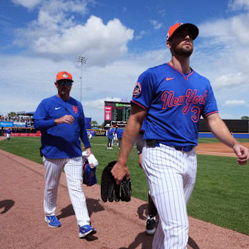 New York Mets pitcher Clay Holmes (35) walks in from the bullpen area before the game against the Houston Astros at Clover Park on Feb. 22.