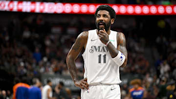 Nov 27, 2024; Dallas, Texas, USA; Dallas Mavericks guard Kyrie Irving (11) walks back up the court during the first quarter against the New York Knicks at the American Airlines Center. Mandatory Credit: Jerome Miron-Imagn Images