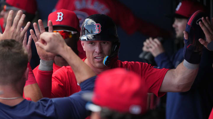Feb 28, 2024; West Palm Beach, Florida, USA;  Boston Red Sox shortstop Romy Gonzalez (center)