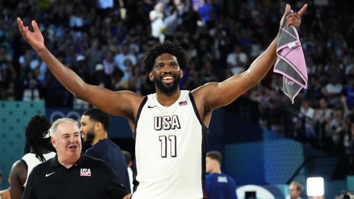 Aug 8, 2024; Paris, France; United States centre Joel Embiid (11) celebrates after the game against Serbia in a men's basketball semifinal game during the Paris 2024 Olympic Summer Games at Accor Arena. Mandatory Credit: Rob Schumacher-USA TODAY Sports