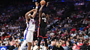 Mar 29, 2025; Philadelphia, Pennsylvania, USA; Miami Heat center Bam Adebayo (13) shoots the ball against the Philadelphia 76ers in the second quarter at Wells Fargo Center. Mandatory Credit: Kyle Ross-Imagn Images