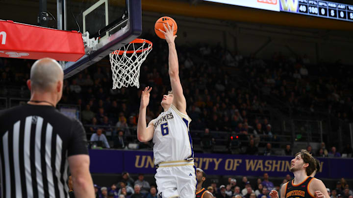 Mar 4, 2026; Seattle, Washington, USA; Washington Huskies forward Hannes Steinbach (6) shoots the ball against the Southern California Trojans during the first half at Alaska Airlines Arena at Hec Edmundson Pavilion. Mandatory Credit: Steven Bisig-Imagn Images
