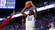 Nov 4, 2025; Lexington, Kentucky, USA; Kentucky Wildcats guard Otega Oweh (00) shoots the ball during the second half against the Nicholls Colonels at Rupp Arena at Central Bank Center. Mandatory Credit: Jordan Prather-Imagn Images