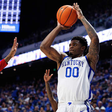Nov 4, 2025; Lexington, Kentucky, USA; Kentucky Wildcats guard Otega Oweh (00) shoots the ball during the second half against the Nicholls Colonels at Rupp Arena at Central Bank Center. Mandatory Credit: Jordan Prather-Imagn Images