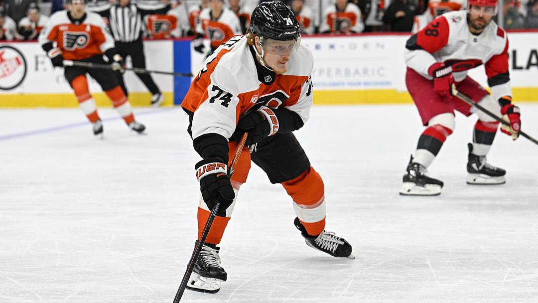 Oct 3, 2026; Philadelphia, Pennsylvania, USA; Philadelphia Flyers right wing Owen Tippett (74) skates with the puck against the Carolina Hurricanes during the second period at Xfinity Mobile Arena.