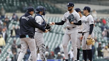 Apr 9, 2025; Detroit, Michigan, USA;  New York Yankees manager Aaron Boone (17) takes the ball to relieve pitcher Devin Williams (38) in the ninth inning against the Detroit Tigers at Comerica Park.