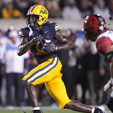 Corey Dyches runs after a catch vs. San Diego State