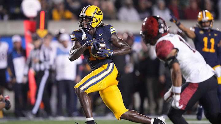 Corey Dyches runs after a catch vs. San Diego State