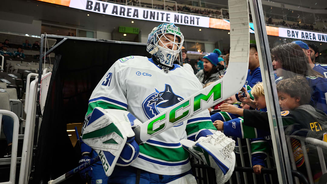 Nov 2, 2024; San Jose, California, USA; Vancouver Canucks goaltender Arturs Silovs (31) walks to the ice for warmups before the game between the Vancouver Canucks and the San Jose Sharks at SAP Center at San Jose. Mandatory Credit: Robert Edwards-Imagn Images 