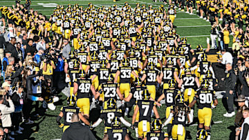 Oct 26, 2024; Iowa City, Iowa, USA; The Iowa Hawkeyes Swarm enters Kinnick Stadium before a game against the Northwestern Wildcats. Mandatory Credit: Jeffrey Becker-Imagn Images