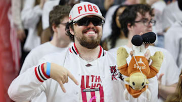 Feb 26, 2025; Fayetteville, Arkansas, USA; Arkansas Razorbacks student section fan prior to the game against the Texas Longhorns at Bud Walton Arena. Mandatory Credit: Nelson Chenault-Imagn Images